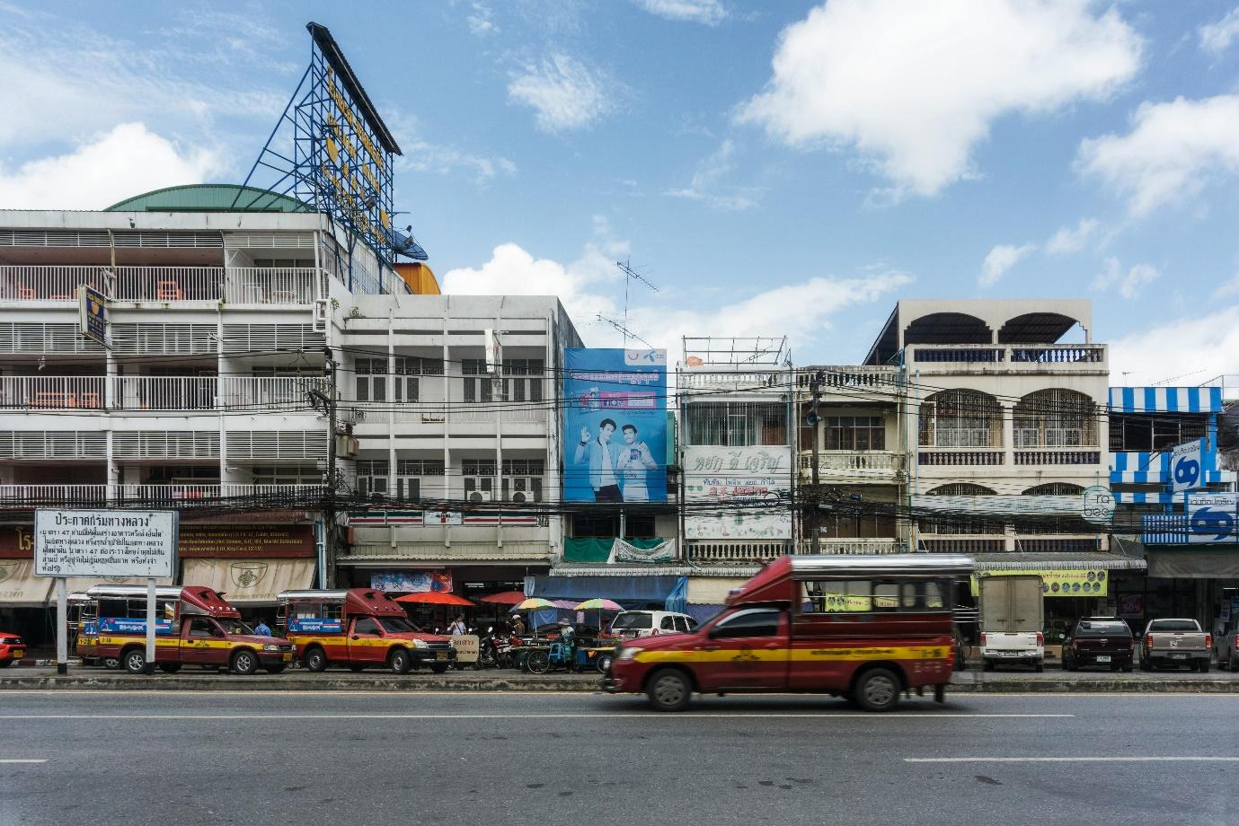 A group of cars on the street AI-generated content may be incorrect.