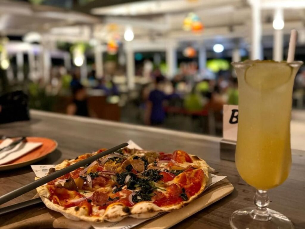 Couples enjoy Sentosa New Year’s Eve countdown party dining at trapizza