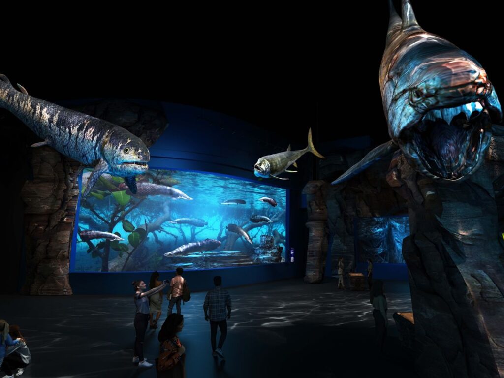 Couples enjoy a romantic NYE celebration at Sentosa with underwater views.
