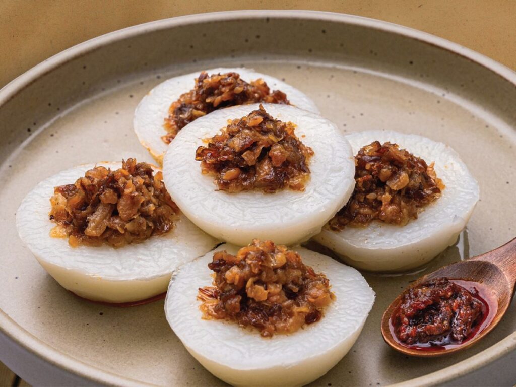Couples exploring the best food at Tiong Bahru Market during a casual date

