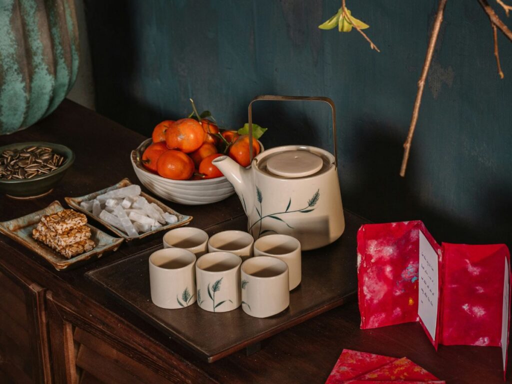 Chinese New Year etiquette Singapore for couples greeting elders during bai nian house visit