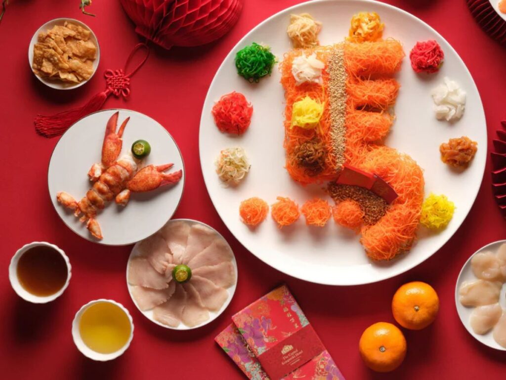 Pok chui deep fried golden crackers added to Lo Hei for Chinese New Year celebration