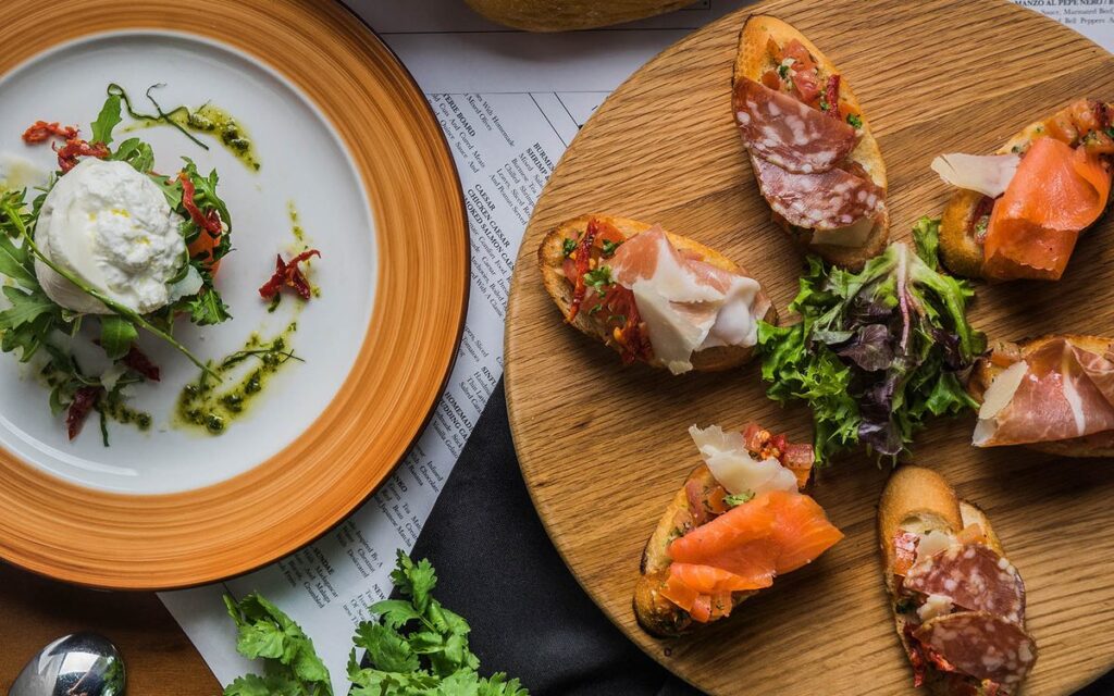 Italian sharing plates at Supply & Demand Esplanade for a cheap date night in Singapore
