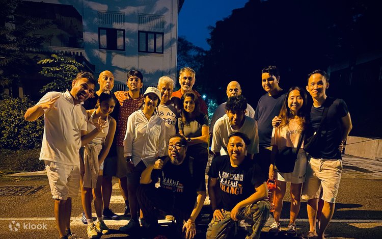 Couples on the Walk With Ghosts: Old Changi Tour at night, a Halloween ghost tour in Singapore