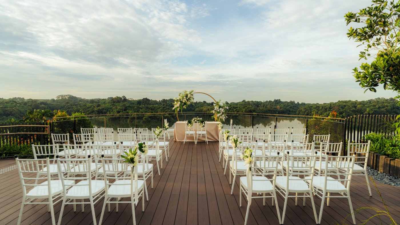 Rooftop wedding ceremony set-up overlooking the rainforest at Mandai Rainforest Resort by Banyan Tree