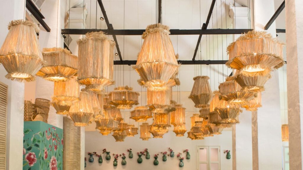 Rattan lanterns in the Candlenut dining room at COMO Dempsey