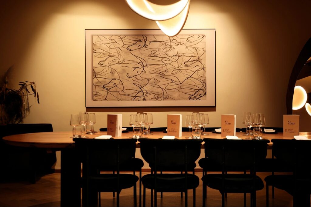 The warmly lit dining room at Ce Soir in Portsdown