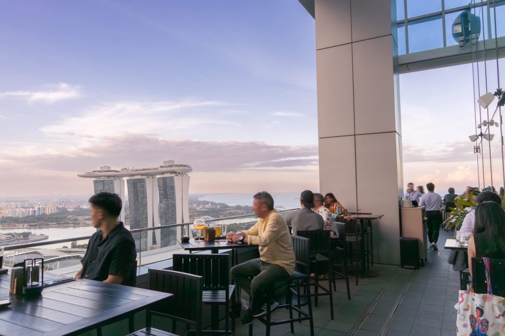 LeVeL33 outdoor terrace looking across Marina Bay to Marina Bay Sands