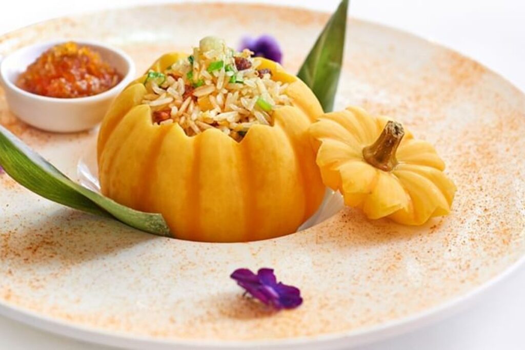A plated pumpkin dish at Min Jiang at Dempsey