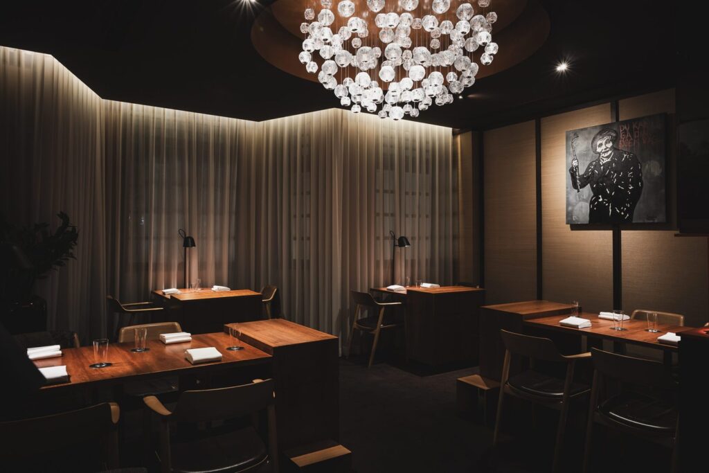 The candlelit dining room at Zén, a three-Michelin-star restaurant in Singapore