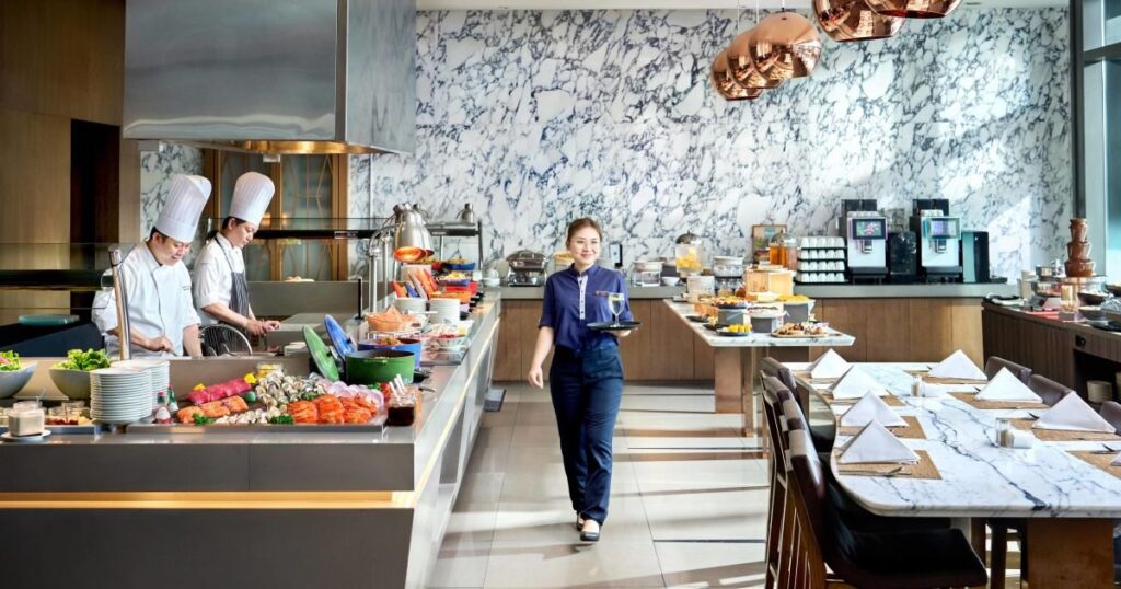 Open kitchen and buffet counters at Plate, Carlton City Hotel Singapore