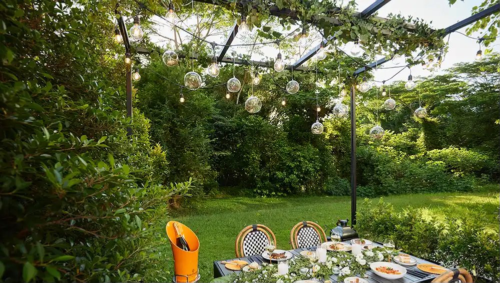 Garden dining set-up in The Backyard at Siri House, Dempsey Hill